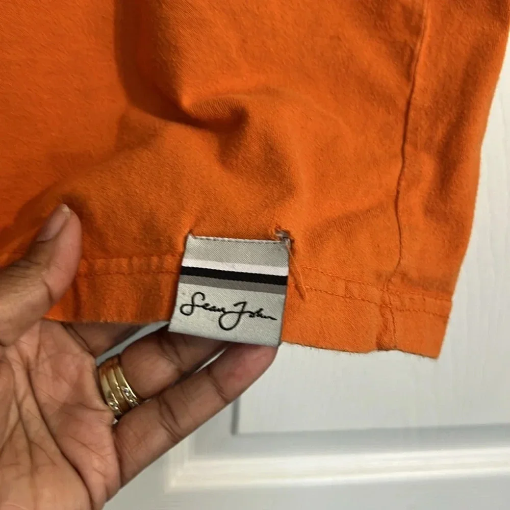 Sean John boys orange tee - size Medium (12/14)